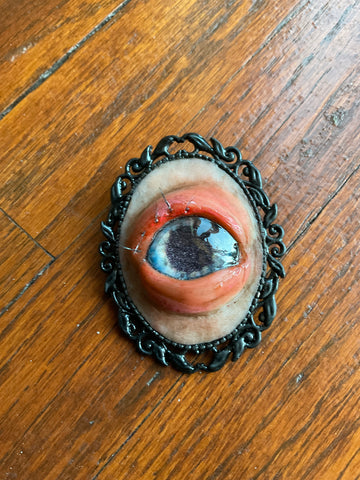 BLUE (left) brooch by artist Denise Bledsoe