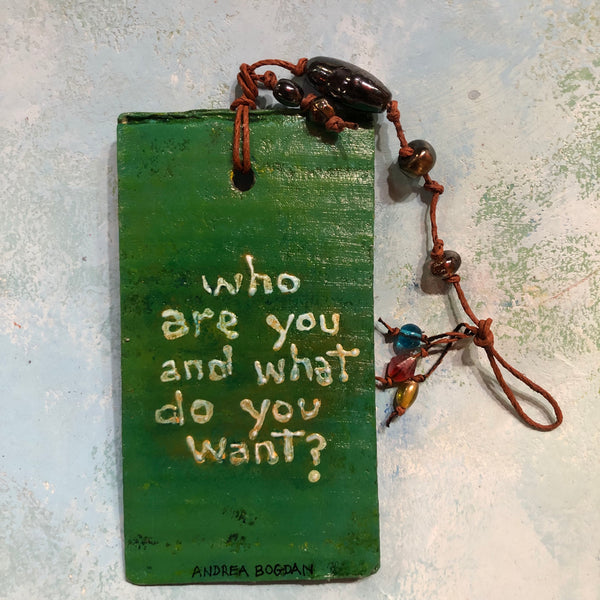"Who are you and what do you want?” watering can and skirt ornament by artist Andrea Bogdan