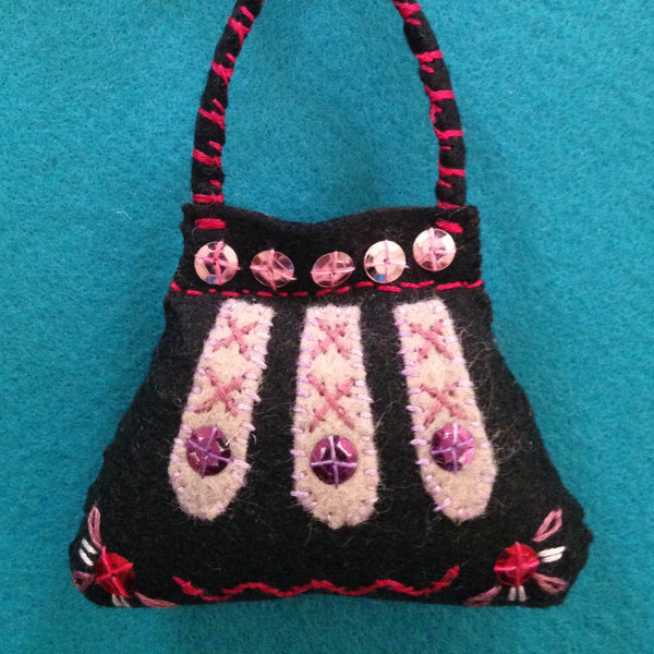 PURSE ORNAMENT, BLACK WITH OLD ROSE #1 by artist Ulla Anobile