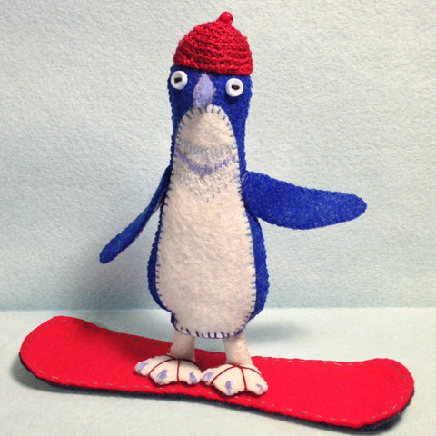 "Little Blue Penguin on Snowboard" by artist Ulla Anobile
