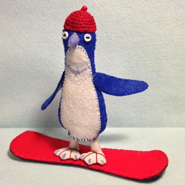"Little Blue Penguin on Snowboard" by artist Ulla Anobile
