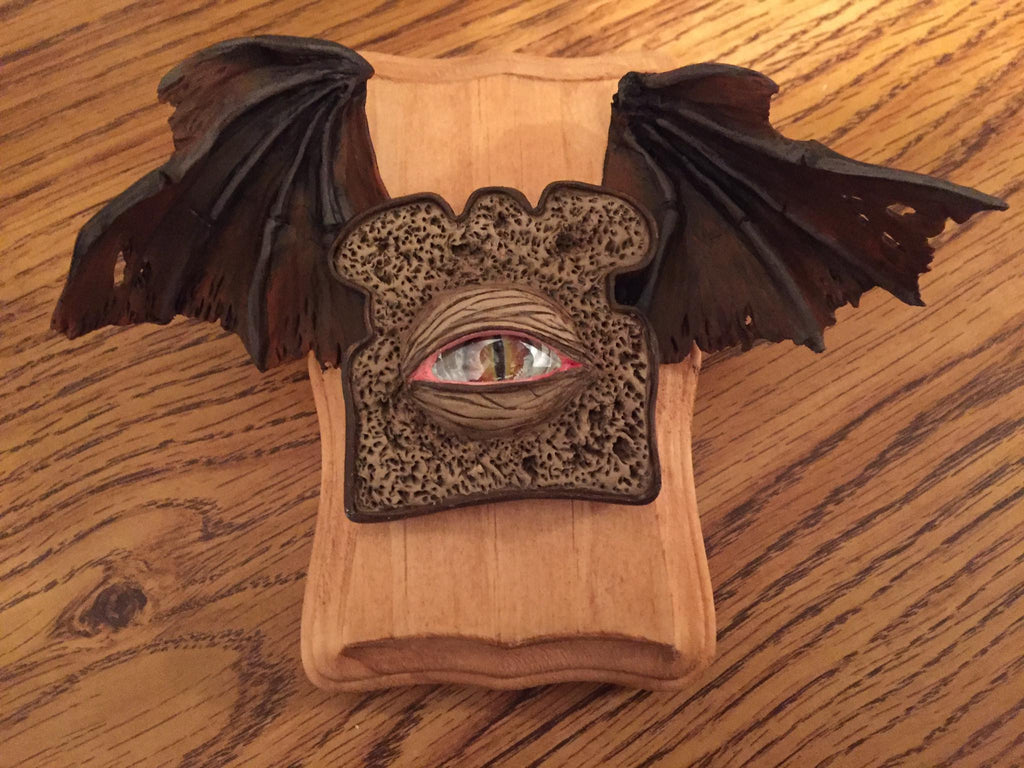Pumpernickel Demon Toast by artist Joe Vollan