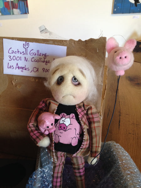 "Pigging Out Boy" by artist Kylie Dexter