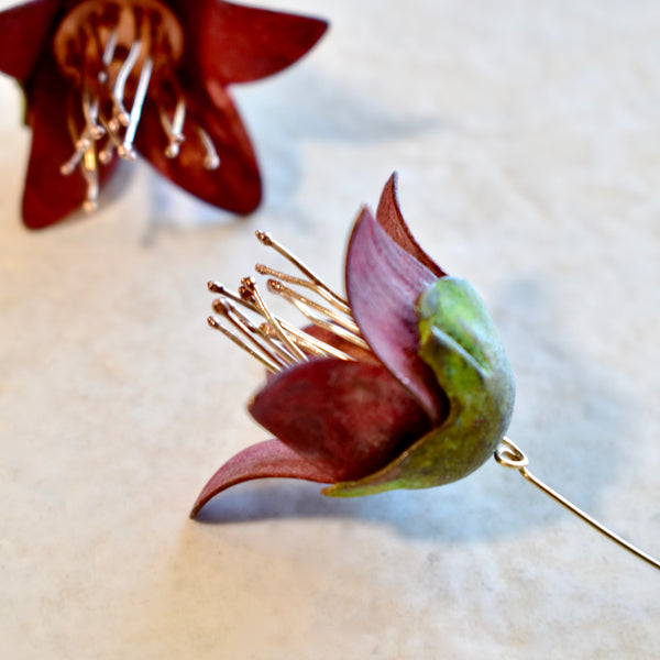 THE RED SILK COTTON OF ARGYLE STREET earrings by artist Chloe Kono