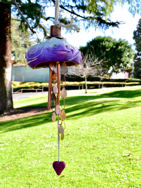THROUGH RAIN OR SHINE by artists Chloe Kono (metalwork) and Randy Kono (sculpture)