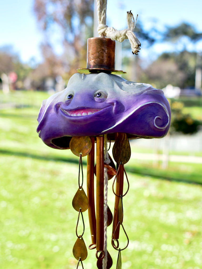 THROUGH RAIN OR SHINE by artists Chloe Kono (metalwork) and Randy Kono (sculpture)