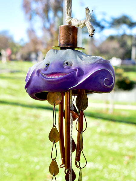 THROUGH RAIN OR SHINE by artists Chloe Kono (metalwork) and Randy Kono (sculpture)
