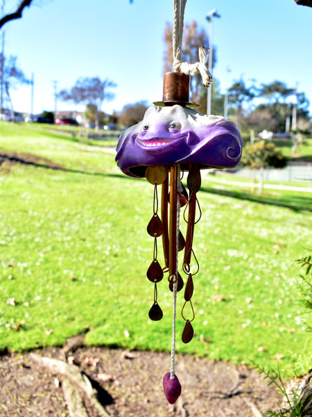 THROUGH RAIN OR SHINE by artists Chloe Kono (metalwork) and Randy Kono (sculpture)