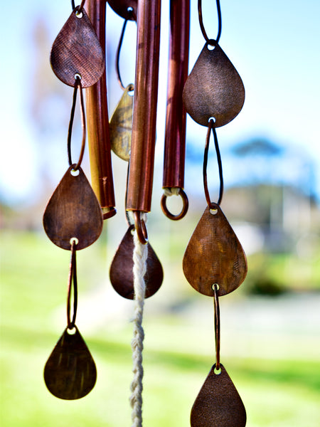 THROUGH RAIN OR SHINE by artists Chloe Kono (metalwork) and Randy Kono (sculpture)