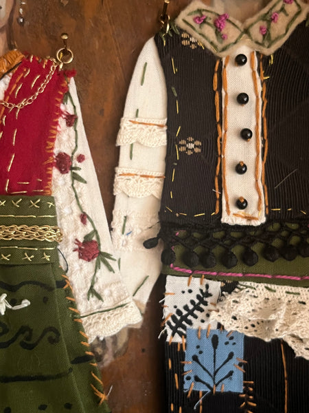 ATHENA AND NIKO by artists Athanasia Nancy Koutsouflakis (painting) and Elisa Cintron (fashion design)