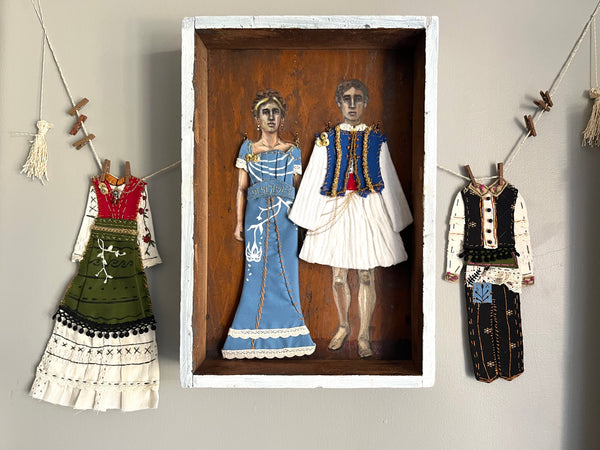 ATHENA AND NIKO by artists Athanasia Nancy Koutsouflakis (painting) and Elisa Cintron (fashion design)