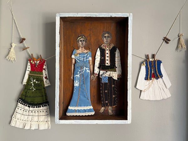 ATHENA AND NIKO by artists Athanasia Nancy Koutsouflakis (painting) and Elisa Cintron (fashion design)