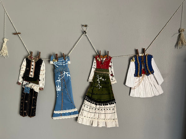 ATHENA AND NIKO by artists Athanasia Nancy Koutsouflakis (painting) and Elisa Cintron (fashion design)