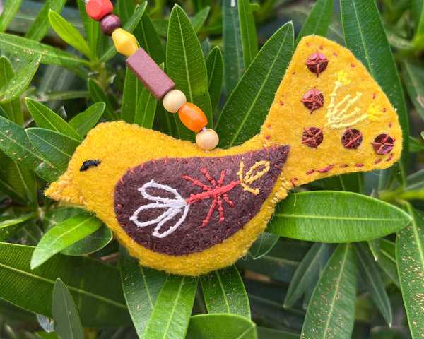 YELLOW BIRD ORNAMENT 1 by artist Ulla Anobile