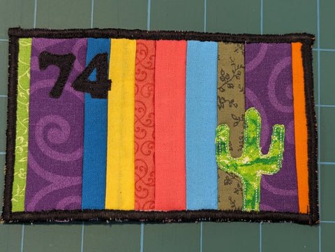 74 EL SARAPE (The Blanket-like Shawl) by artist Chris Rodríguez