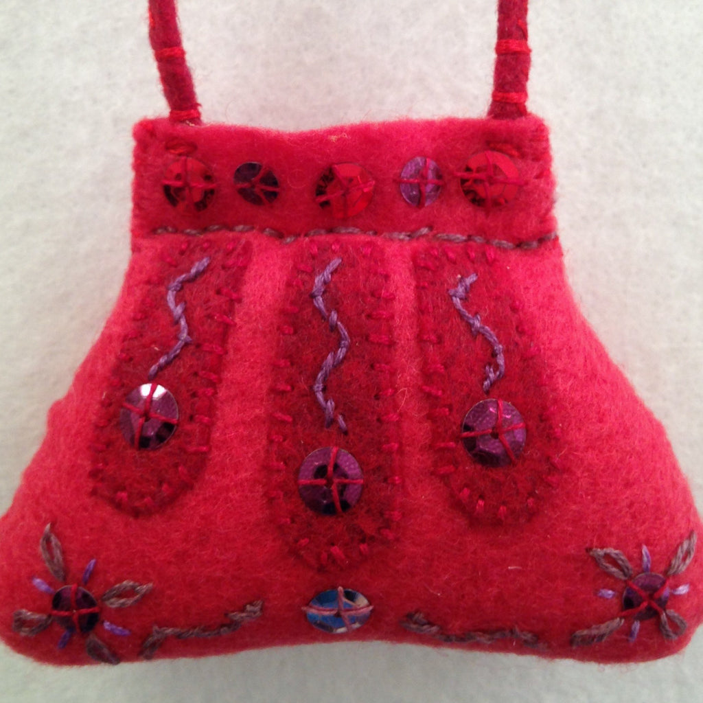 PURSE ORNAMENT, LIPSTICK RED WITH CRANBERRY #6 by artist Ulla Anobile