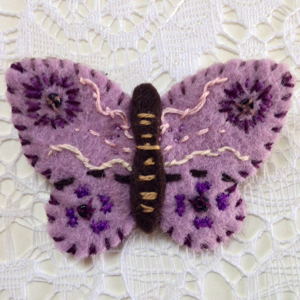 "Mauve Butterfly Pin #1" by artist Ulla Anobile