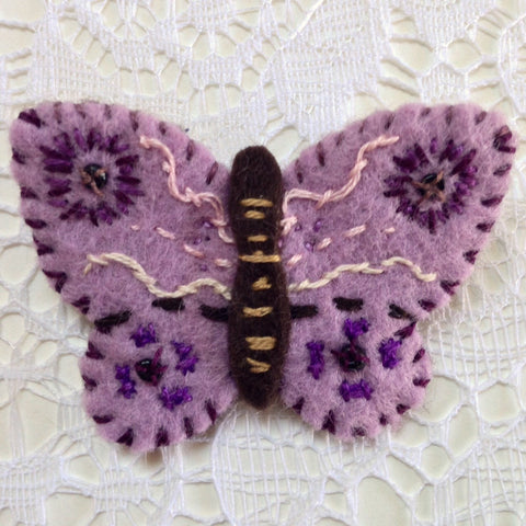 "Mauve Blue Butterfly Pin #1" by artist Ulla Anobile