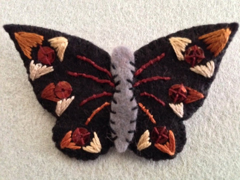 "Black Butterfly Pin #2 Copper II" by artist Ulla Anobile