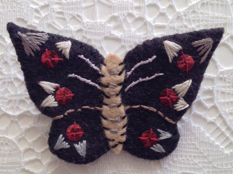 "Black Butterfly Pin #2" by artist Ulla Anobile