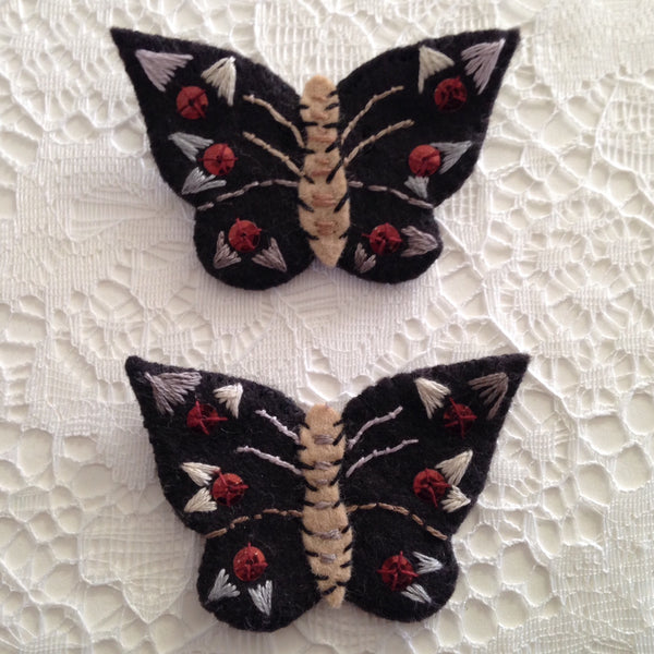 "Black Butterfly Pin #2" by artist Ulla Anobile