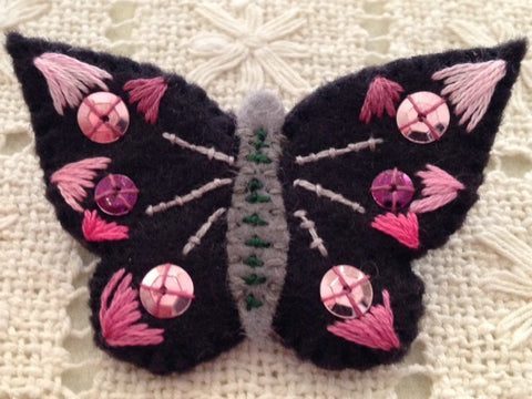 BUTTERFLY PIN (pink and mauve sequins) by artist Ulla Anobile