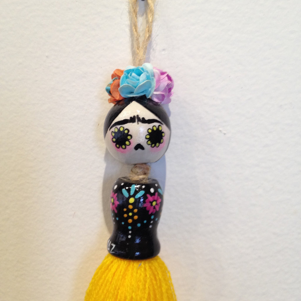 "Frida Tassel Doll, Yellow" by artist Jazmin Molina