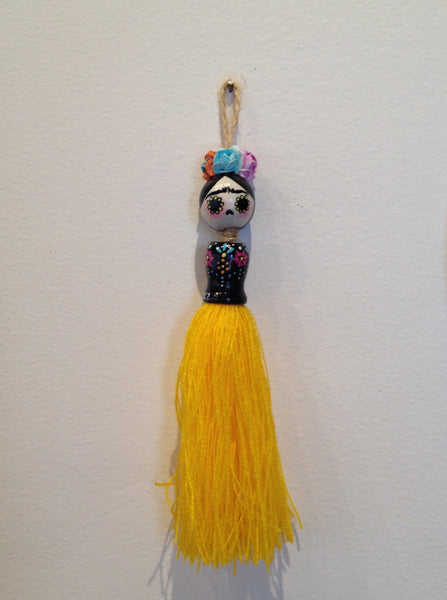"Frida Tassel Doll, Yellow" by artist Jazmin Molina