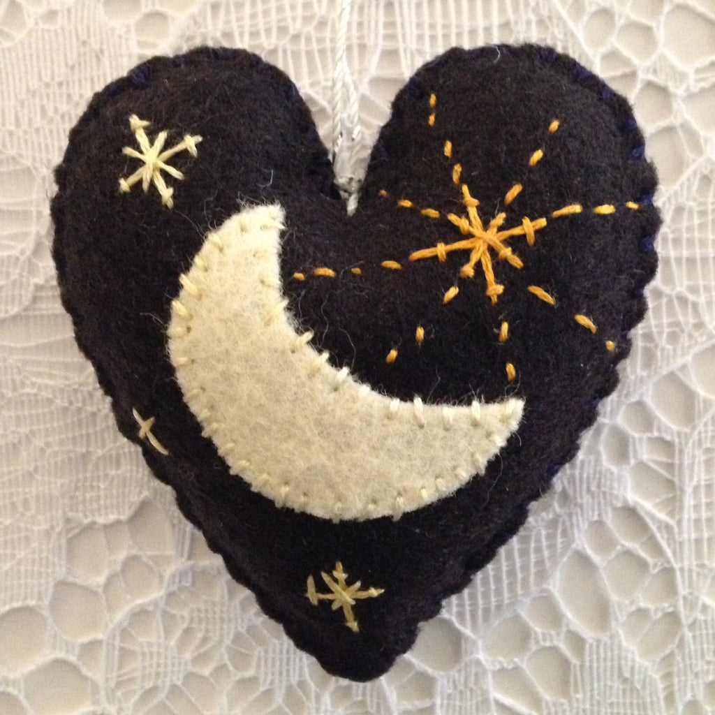 "Moon & Stars Black Heart Ornament" by artist Ulla Anobile