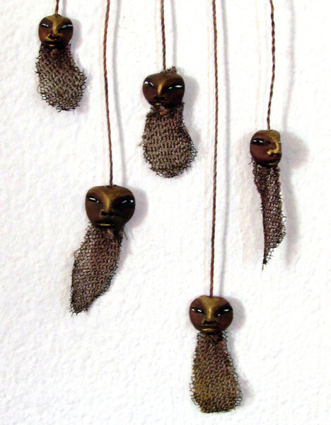 HANGING DREAM CATCHER with 5 SMALL FACES by artist Patricia Krebs